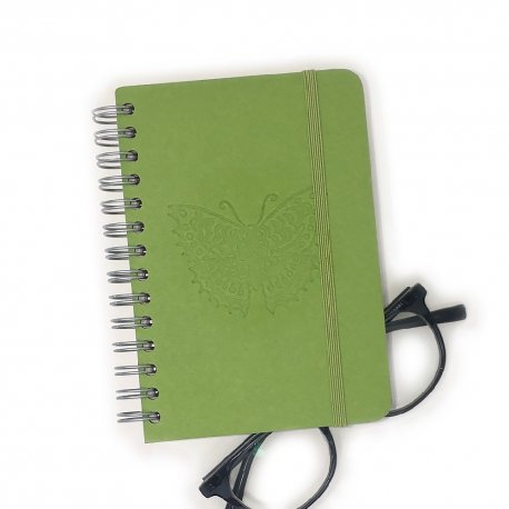 A sublimely subtle butterfly is "blind" stamped on the cover of this jotter.
