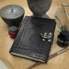 JournalsAndBooks' Exotic Handmade Leather Journal with Handmade Paper is also available in black.