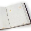 Inside our "Tree of Life Journal," the beautiful hand-made wildflower paper tells a tale of its own.